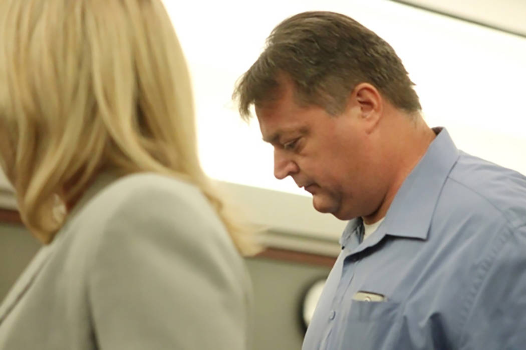 James R. Cooper Jr. leaves the courtroom at the regional Justice Center on oct. 8, 2015. (Erik Verduzco/Las Vegas Review-Journal)