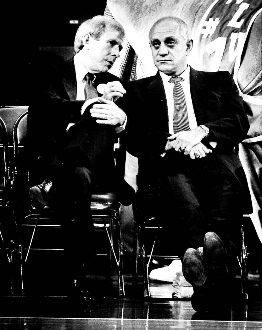 UNLV president Robert Maxson, left, talks to UNLV head basketball coach Jerry Tarkanian before the start of a Rebel home game at the Thomas & Mack Center in 1987. (Review-Journal File)