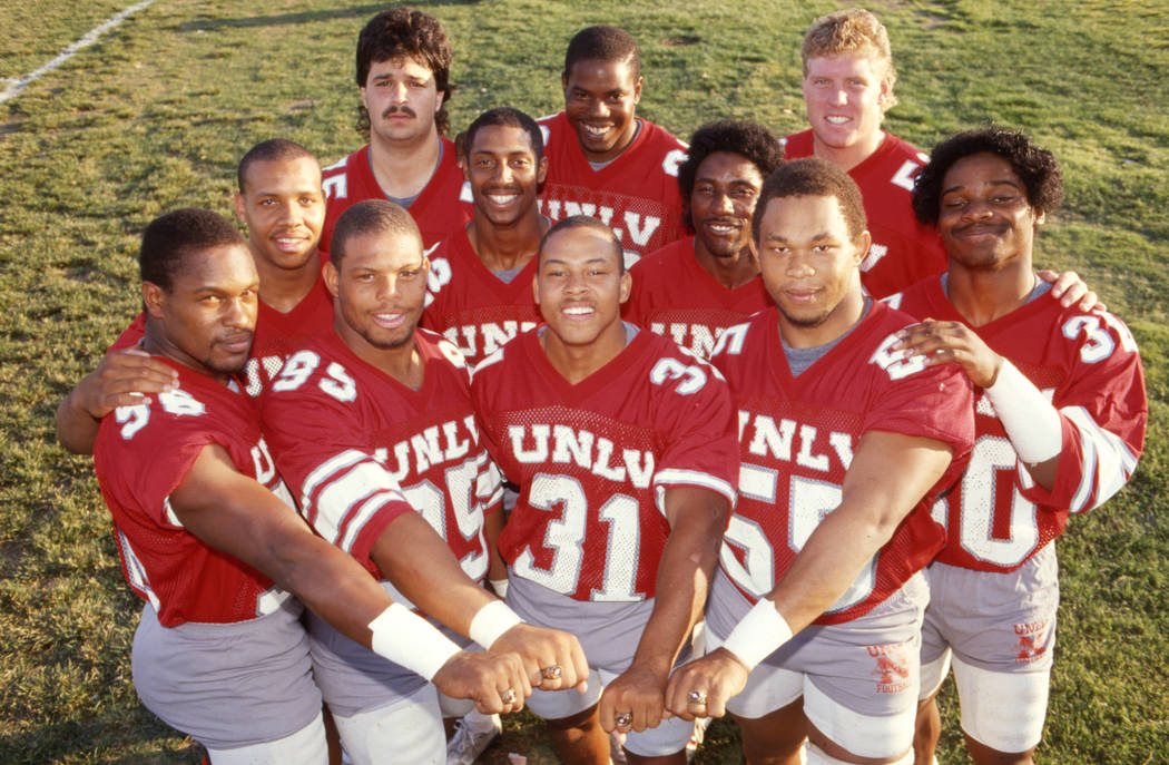 UNLV football team seniors wearing their 1984 Pacific Coast Athletic Association "championship" rings. (Review-Journal File)