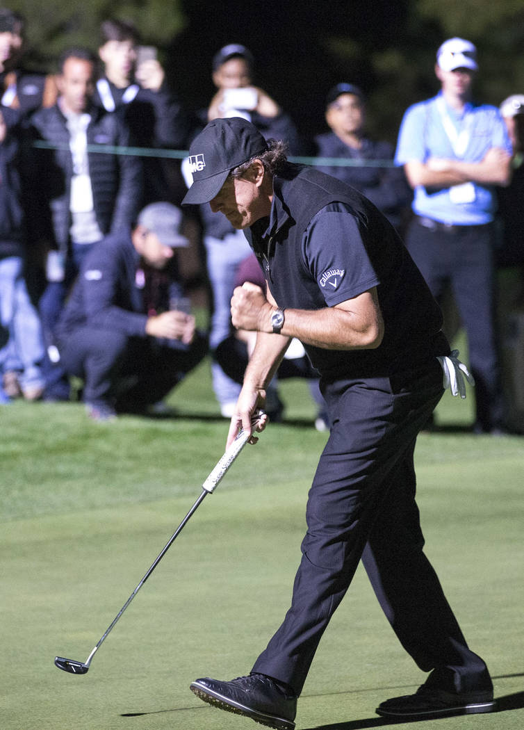 Phil Mickelson reacts after sinking a game winning putt to defeat Tiger Woods in The Match at Shadow Creek Golf Course in North Las Vegas on Friday, Nov. 23, 2018. Richard Brian Las Vegas Review-J ...