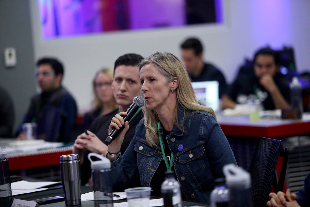 Ciara Byrne, co-founder and CEO of Green our Planet, asks a question of the presenter at the 2018 Techstars Startup Weekend at Rob Roy's Innevation Center in Las Vegas, Sunday, Nov. 18, 2018. With ...