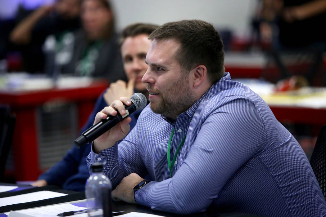 Piotr Tomasik, co-founder and CTO of Influential, asks a question of the presenter at the 2018 Techstars Startup Weekend at Rob Roy's Innevation Center in Las Vegas, Sunday, Nov. 18, 2018. With th ...