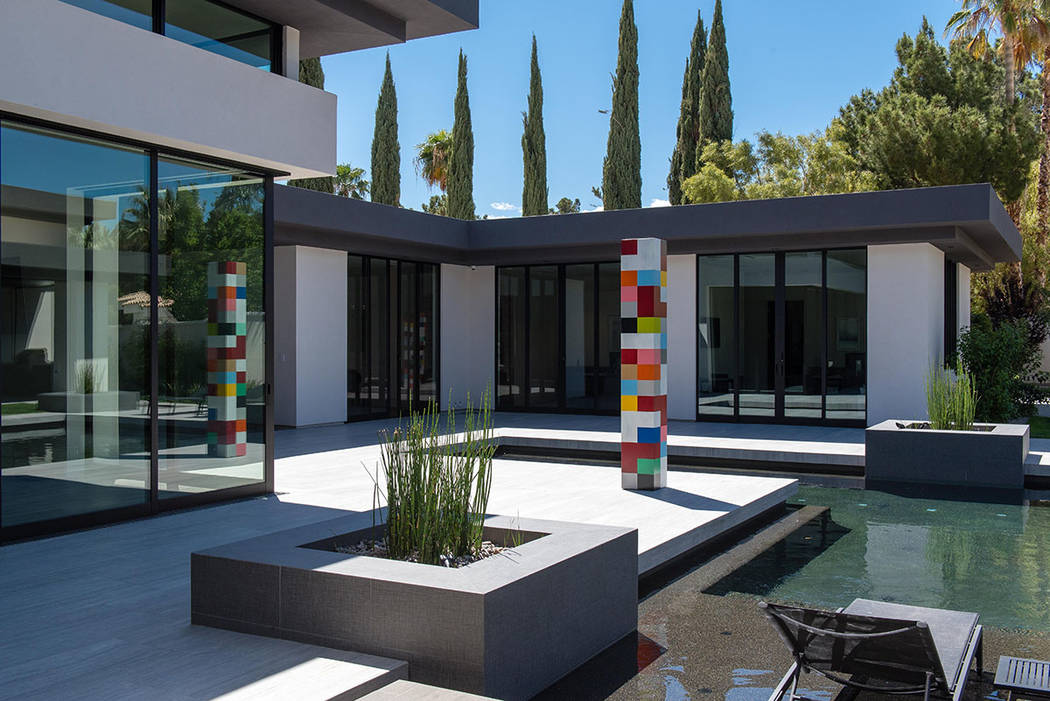 The pool area connects spaces. (Studio g Architecture)