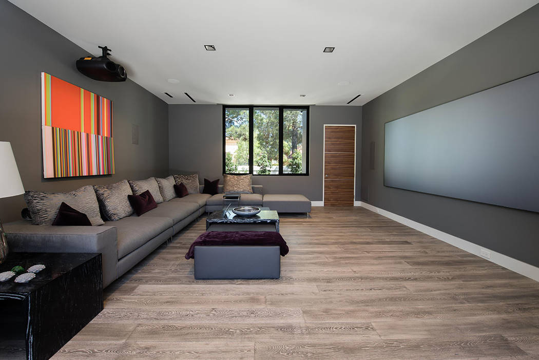 The home theater is large. (Studio g Architecture)