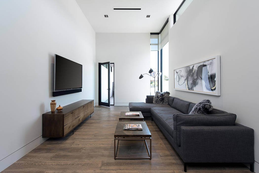 A sitting room at the entrance of the home. (Studio g Architecture)