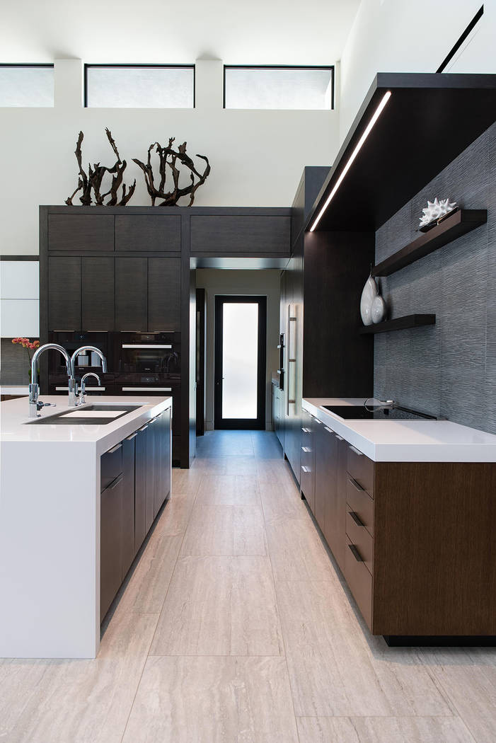 The kitchen has a modern design with clean lines. (Studio g Architecture)