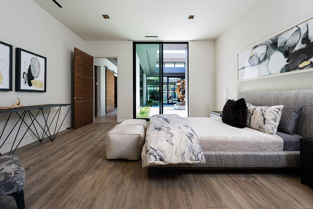 A secondary bedroom is near the courtyard. (Studio g Architecture)