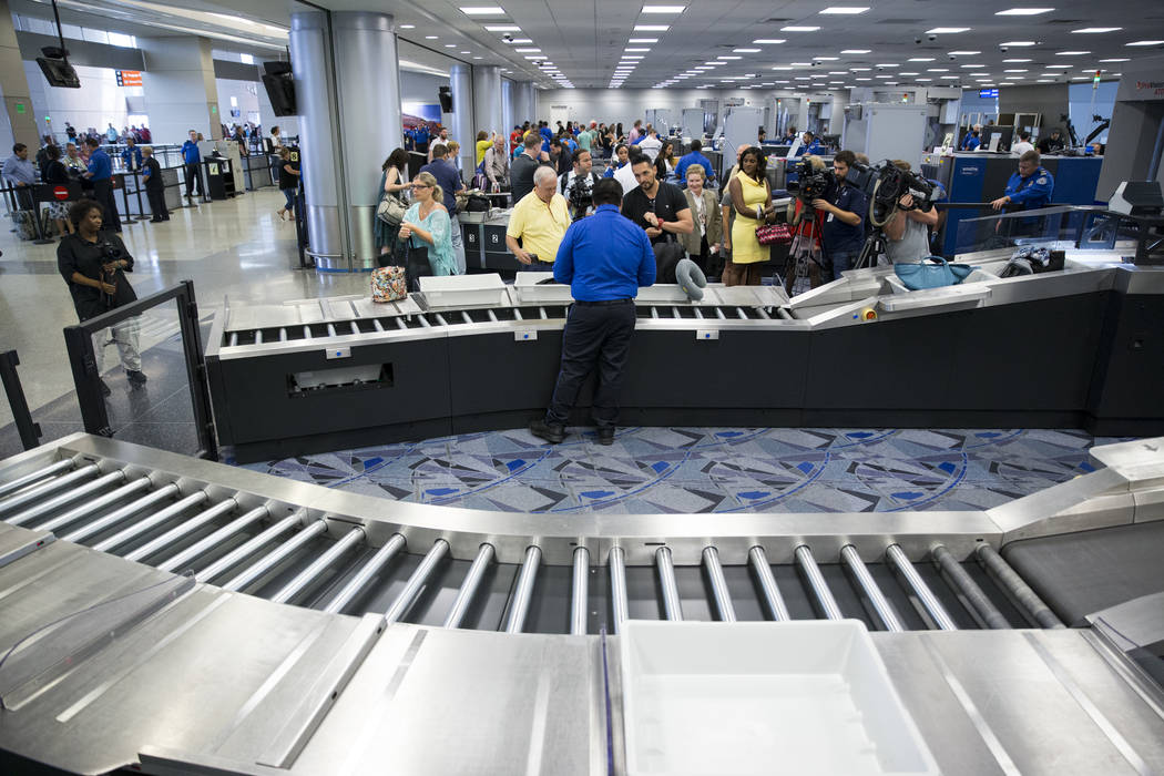 Passengers enter security to one of the new automated screening lanes at McCarran International Airport Terminal 3 in Las Vegas, on Thursday, Aug. 31, 2017. Erik Verduzco Las Vegas Review-Journal ...