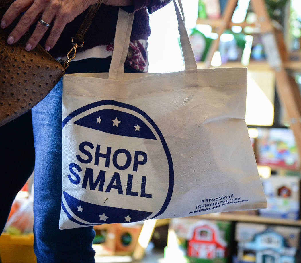 Henderson resident Corinne Vaughn carries a shop small tote bag during Shop Small Henderson in Henderson, Saturday, Nov. 24, 2018. Caroline Brehman/Las Vegas Review-Journal