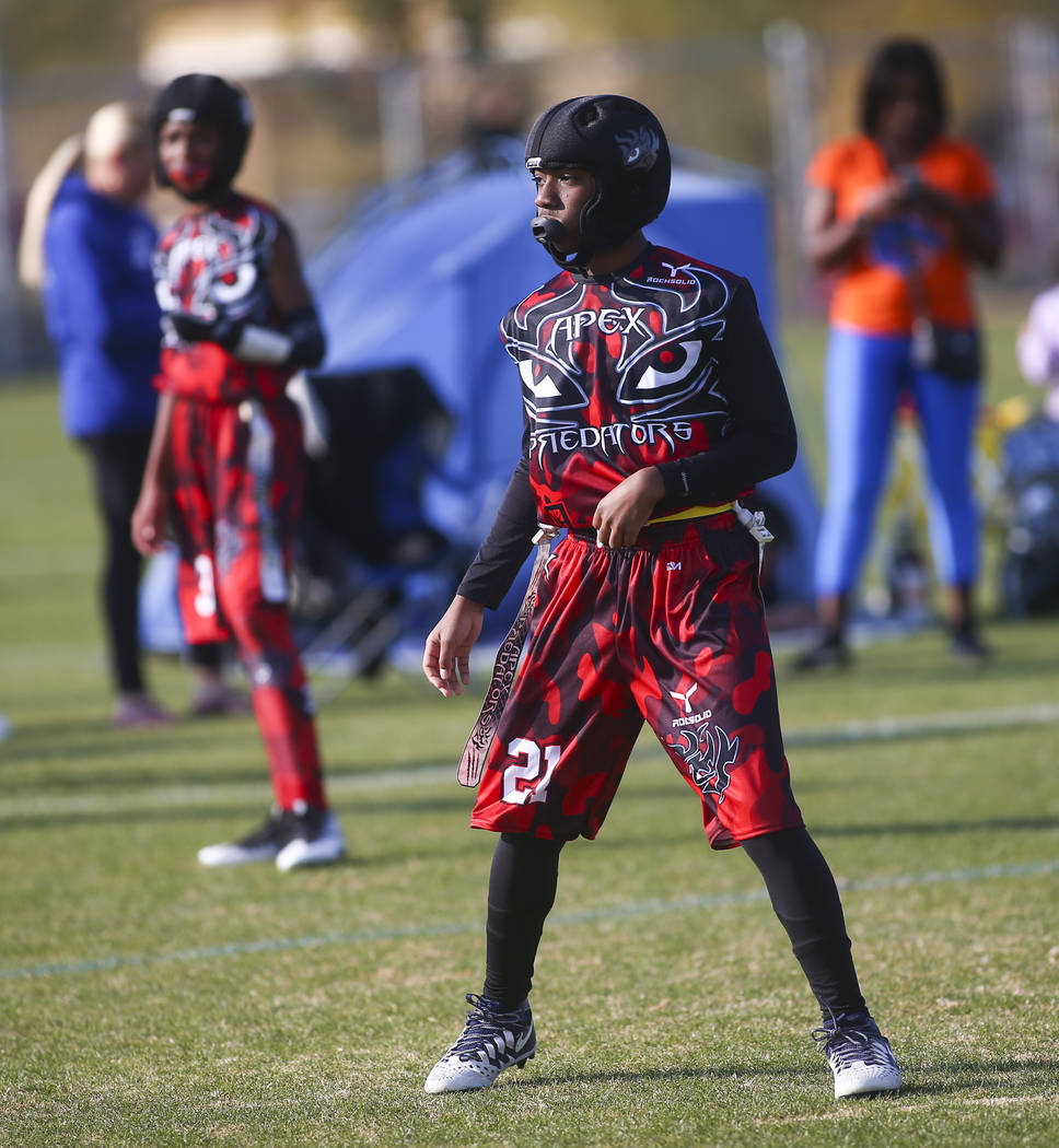 Apex Predators' Darius McClendon looks on while playing against the Ballers during a National Youth Sports of Nevada championship flag football game at Aventura Park in Henderson on Saturday, Nov. ...