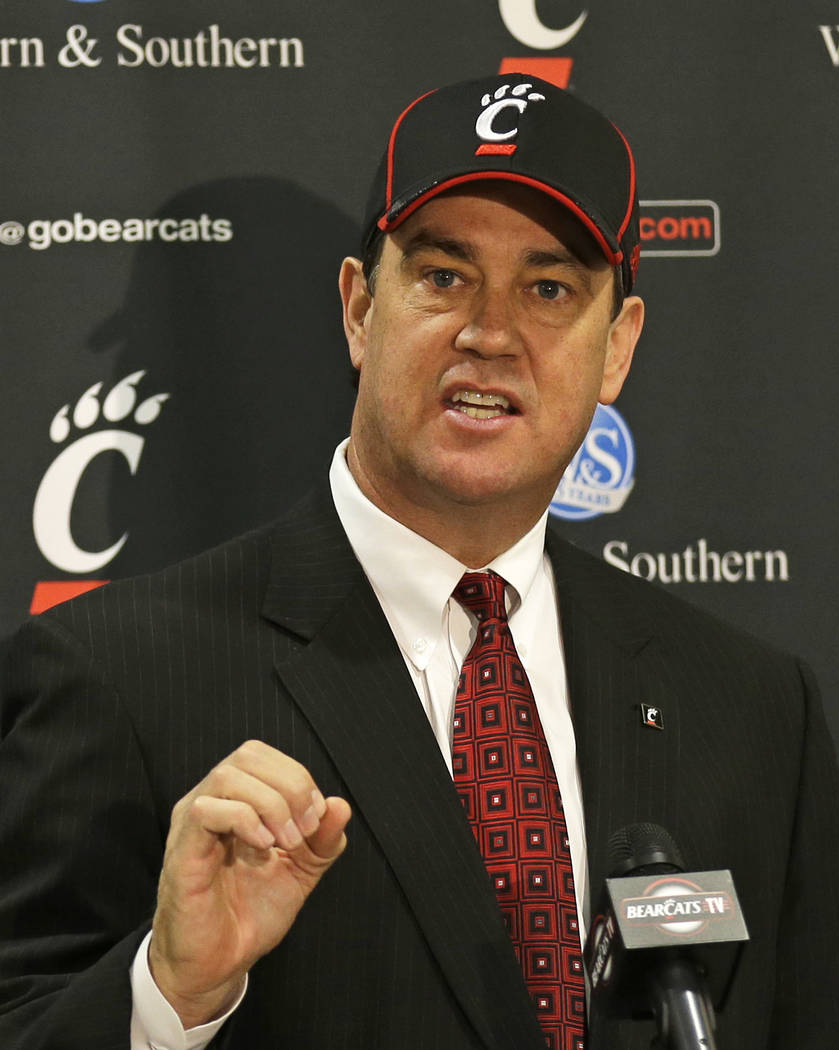 Mike Bohn speaks at a news conference after he was named the new athletic director at the University of Cincinnati, Thursday, Feb. 6, 2014, at the university in Cincinnati. Bohn had been athletic ...