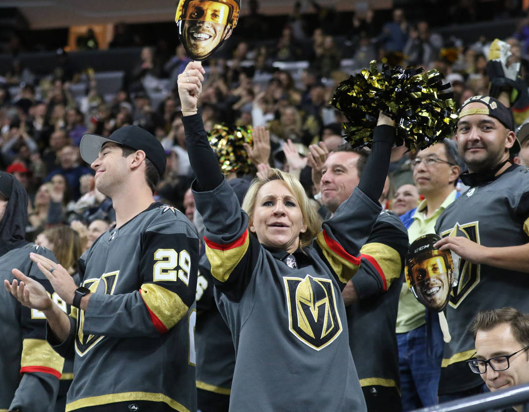 A fan celebrates Vegas Golden Knights defenseman Colin Miller's (6) goal during the third period of an NHL game against the Calgary Flames in Las Vegas, Friday, Nov. 23, 2018. Heidi Fang Las Vegas ...