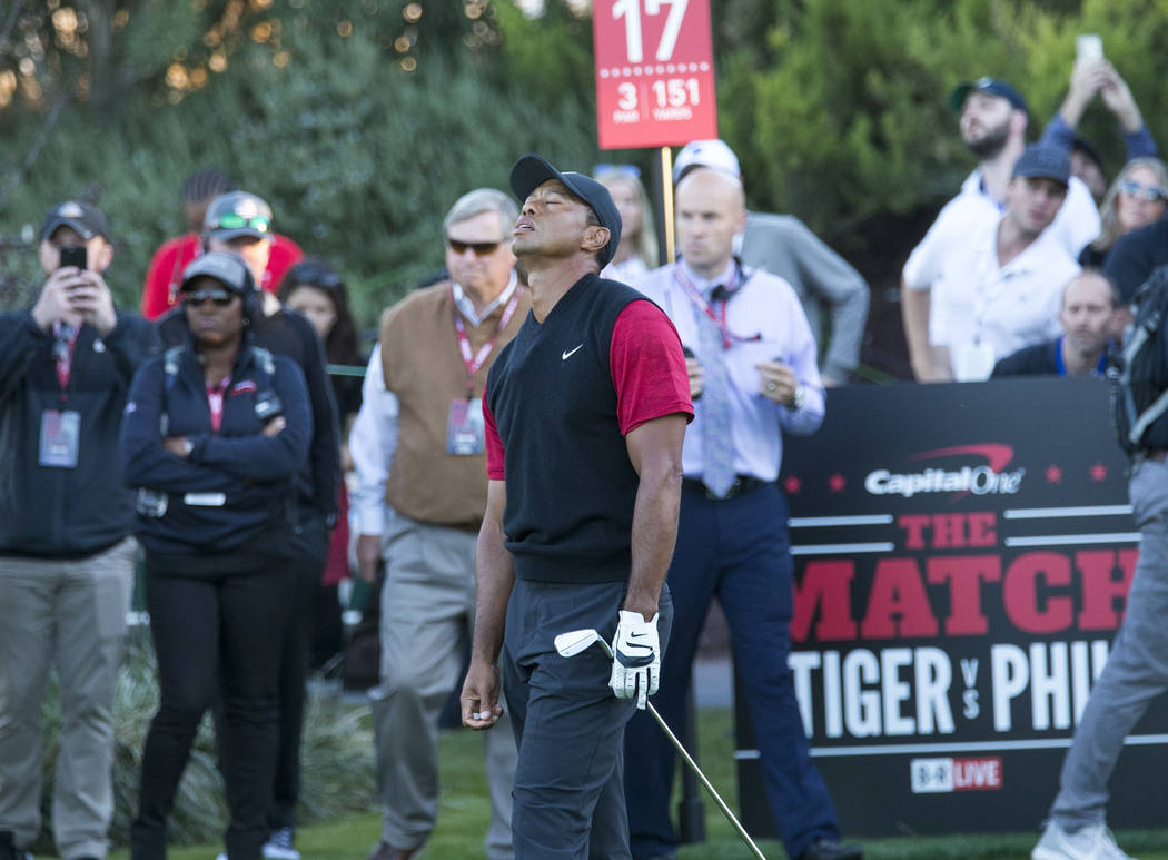 Tiger Woods reacts to his shot from the 17th tee box during The Match at Shadow Creek Golf Course in North Las Vegas on Friday, Nov. 23, 2018. Richard Brian Las Vegas Review-Journal @vegasphotograph