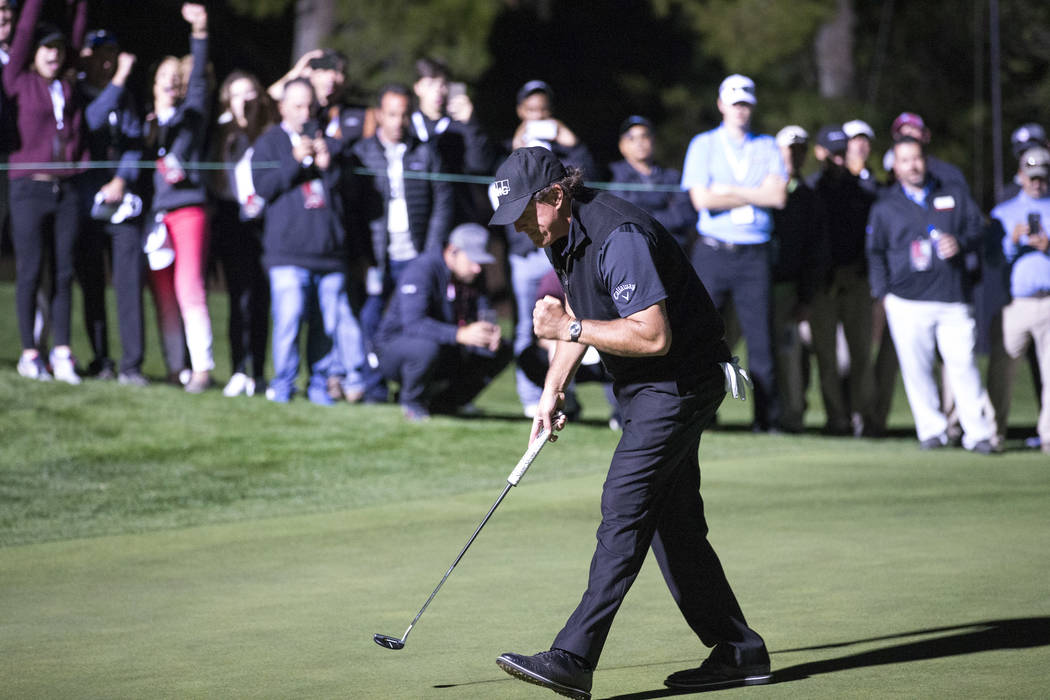 Phil Mickelson reacts after sinking a game winning putt to defeat Tiger Woods in The Match at Shadow Creek Golf Course in North Las Vegas on Friday, Nov. 23, 2018. Richard Brian Las Vegas Review-J ...