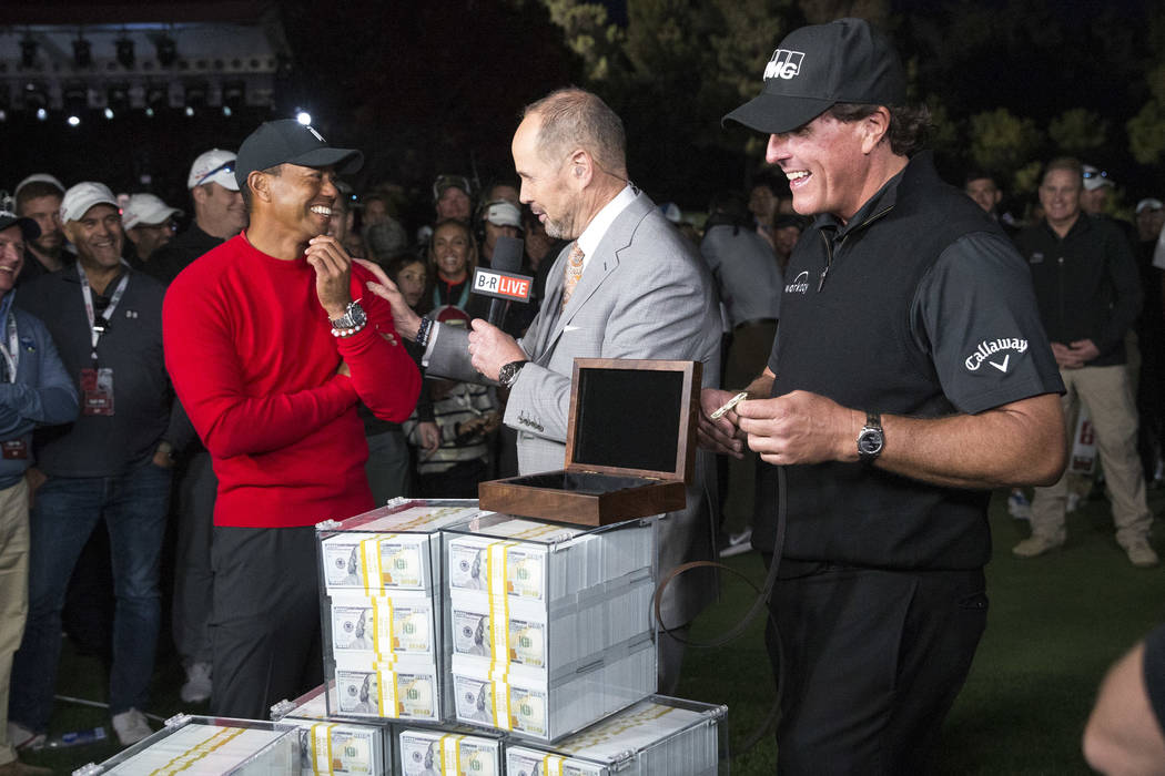 Tiger Woods, left, and Phil Mickelson do a post game interview after Mickelson won The Match at Shadow Creek Golf Course in North Las Vegas on Friday, Nov. 23, 2018. Richard Brian Las Vegas Review ...