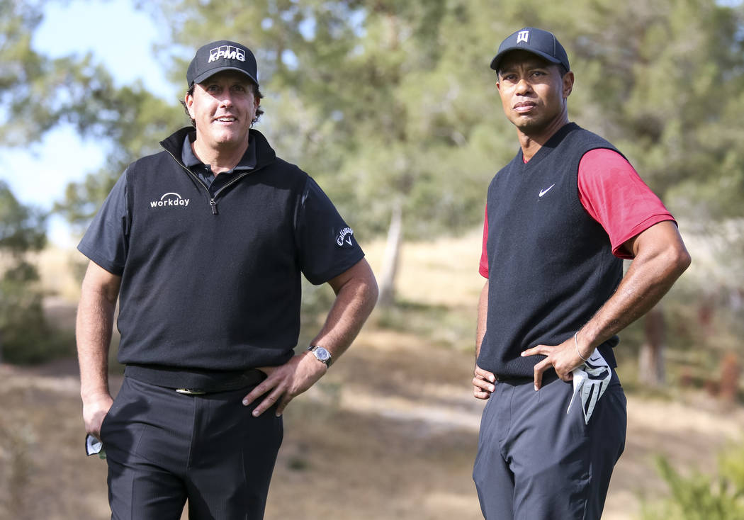 Phil Mickelson, left, and Tiger Woods stand at the first tee box before The Match at Shadow Creek Golf Course in North Las Vegas on Friday, Nov. 23, 2018. Richard Brian Las Vegas Review-Journal @v ...
