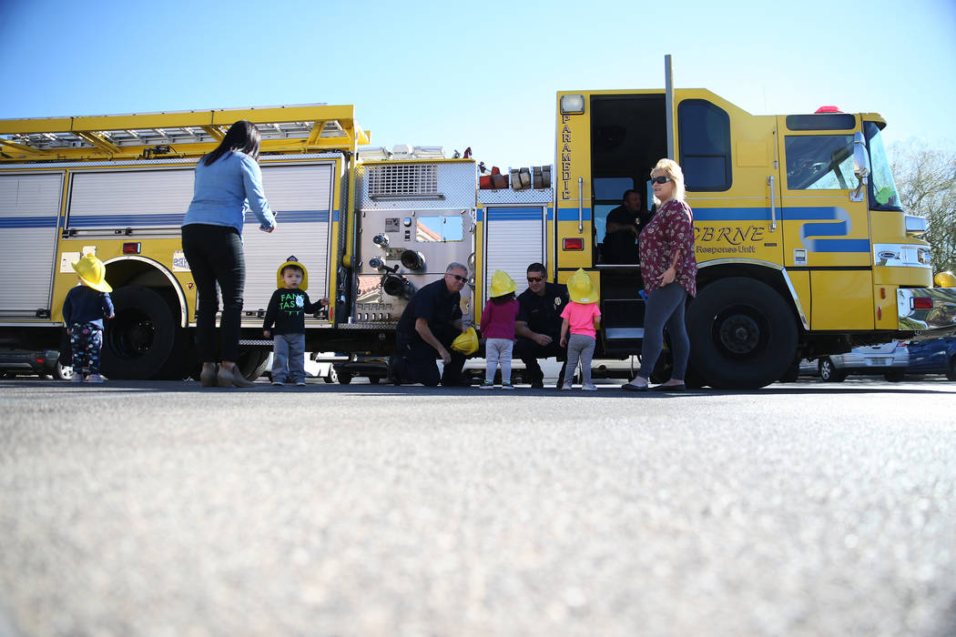 Children meet Clark County Fire Department firefighters during a fire awareness visit at Merryhill Preschool, 5055 S. Durango Dr., in Las Vegas, Wednesday, Oct. 24, 2018. Erik Verduzco Las Vegas R ...