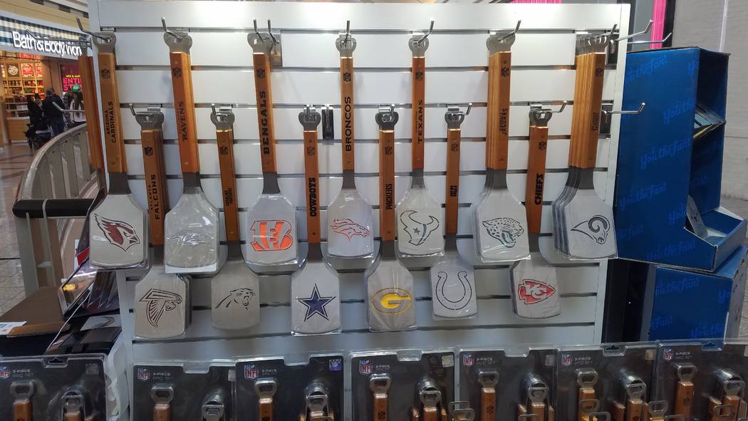 A new product sold in a small kiosk at the Galleria at Sunset is the Sportula, a cooking utensil grillers can use to make the impression of a sports team’s logo in a hamburger or a cut of meat. ...