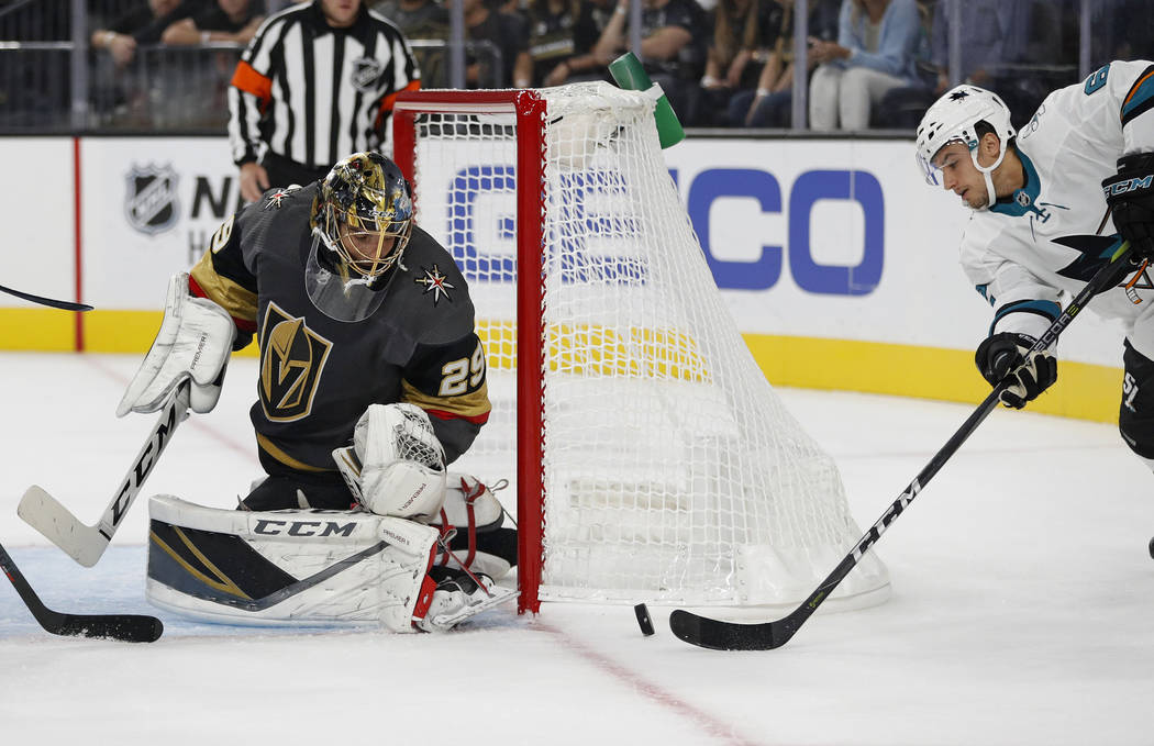 Vegas Golden Knights goaltender Marc-Andre Fleury (29) blocks a shot by San Jose Sharks right wing Kevin Labanc during the first period of a preseason NHL hockey game Sunday, Sept. 30, 2018, in La ...