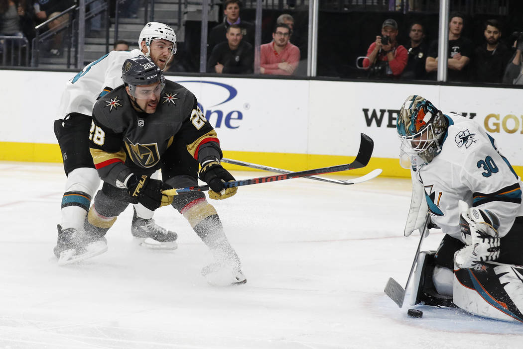 Vegas Golden Knights left wing William Carrier (28) scores on San Jose Sharks goaltender Aaron Dell (30) during the second period of an NHL hockey game Saturday, Nov. 24, 2018, in Las Vegas. (AP P ...