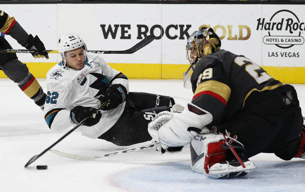 San Jose Sharks right wing Kevin Labanc (62) falls while trying to shoot on Vegas Golden Knights goaltender Marc-Andre Fleury (29) during the third period of an NHL hockey game Saturday, Nov. 24, ...