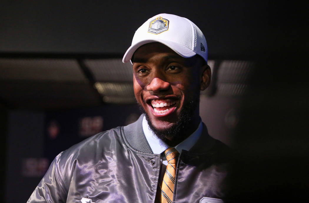 Josh Johnson wears a San Diego Fleet hat after becoming its first draft pick during the Alliance of America Football (AAF) Quarterback Draft at the Luxor in Las Vegas, Tuesday, Nov. 27, 2018. Caro ...