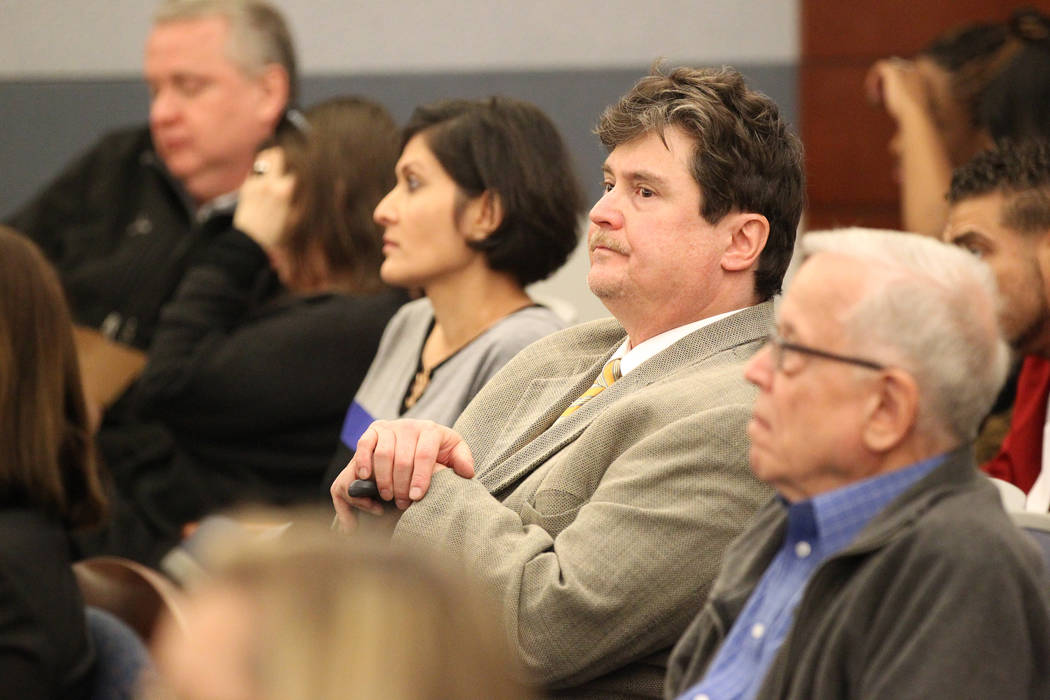 Mark Georgantas, second from right, who persuaded people to give him money for what prosecutors said was a casino scam, waits to be sentenced at the Regional Justice Center in Las Vegas on Feb. 26 ...