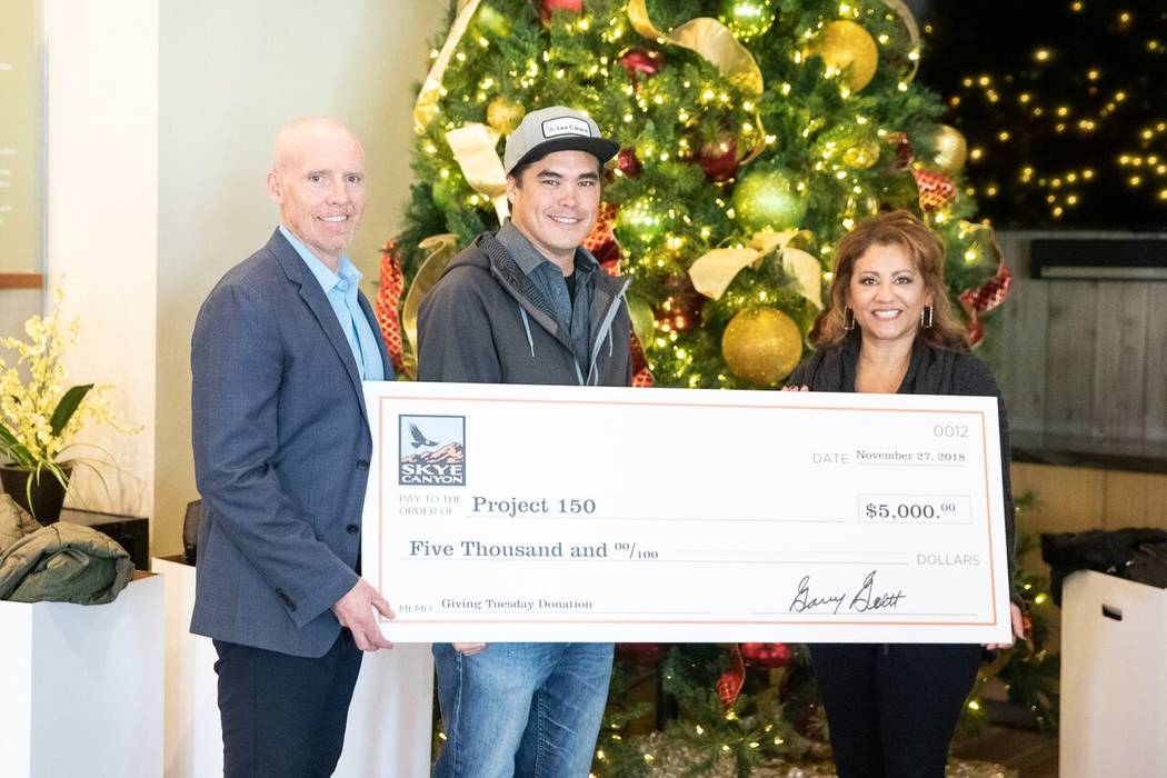 From left, Chris Armstrong, senior vice president for Olympia Cos.; Jim Seely, Lee Canyon’s marketing director; and Meli Pulido, Project 150’s executive director. Skye Canyon and Lee Canyon co ...
