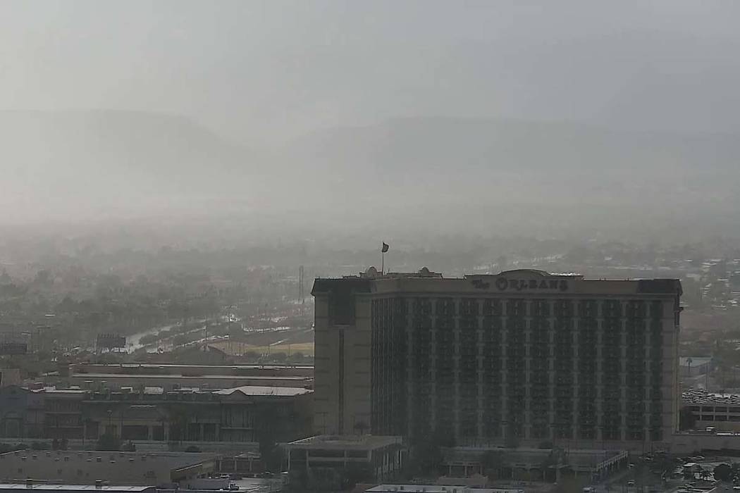 Clouds and rain obscure the Spring Mountains in this view of the western Las Vegas Valley on Thursday in this image from the Raiders stadium cam on reviewjournal.com. (Las Vegas Review-Journal)