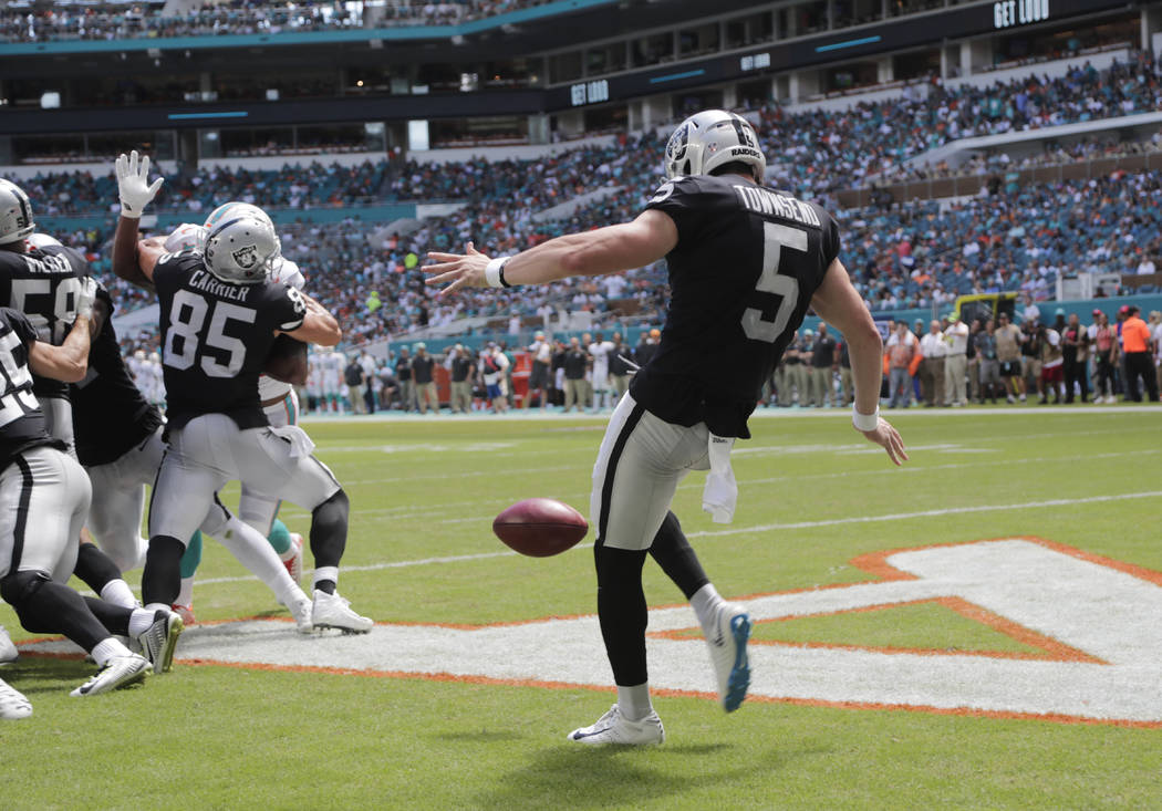Oakland Raiders punter Johnny Townsend (5) punts the ball on the fourth down during the first half of an NFL football game against the Miami Dolphins, Sunday, Sept. 23, 2018 in Miami Gardens, Fla. ...