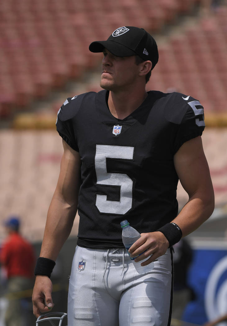 Oakland Raiders punter Johnny Townsend watches during warm ups before an NFL preseason football game against the Los Angeles Rams Saturday, Aug. 18, 2018, in Los Angeles. (AP Photo/Mark J. Terrill)