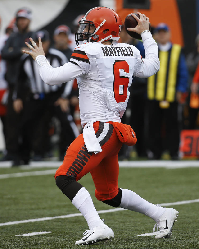 Cleveland Browns quarterback Baker Mayfield passes in the second half of an NFL football game against the Cincinnati Bengals, Sunday, Nov. 25, 2018, in Cincinnati. (AP Photo/Frank Victores)