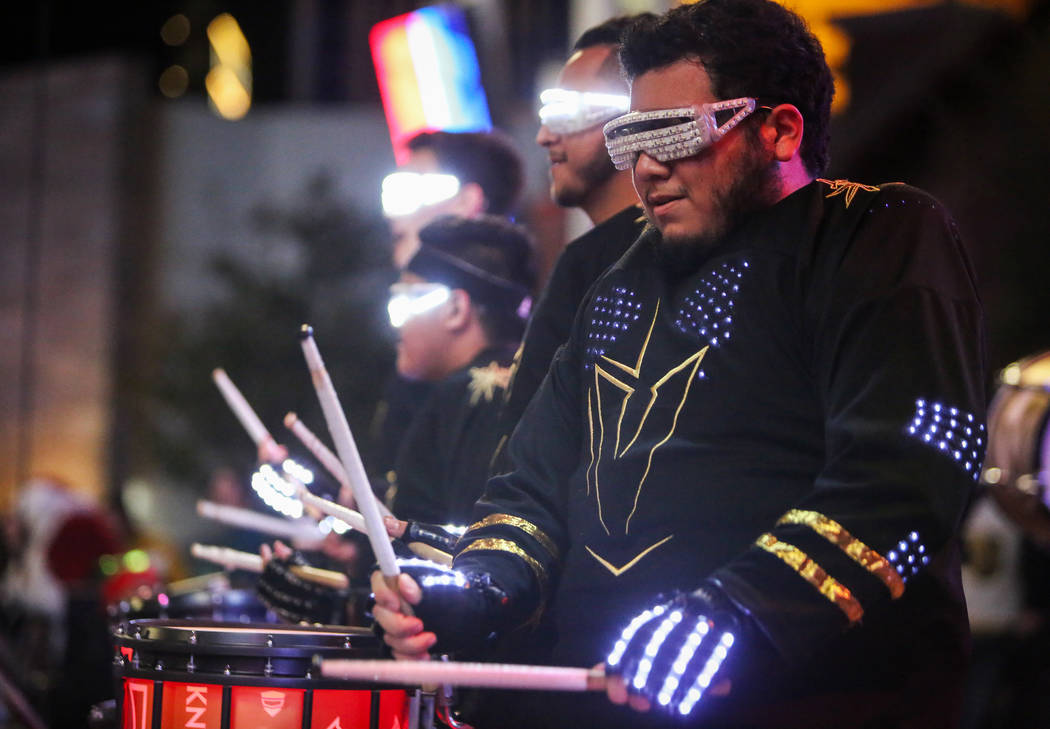 Golden Knights drum line performs at a tree-lighting ceremony as a part of The Holiday Experience at The Park in Las Vegas, Thursday, Nov. 29, 2018. Caroline Brehman/Las Vegas Review-Journal