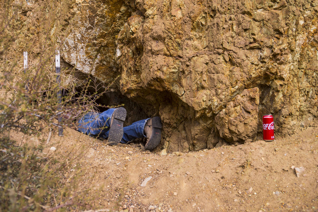 Caden Gould of Genoa enters a mine in search of old denim and other antiquities in south Douglas County on Thursday, Oct. 11, 2018. Mines in the area date as far back as the 1860s and 1870s. Chase ...