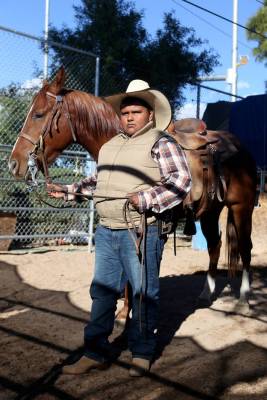 Miguel Alamos, 13, with Rojo at Broadacres Marketplace in ...