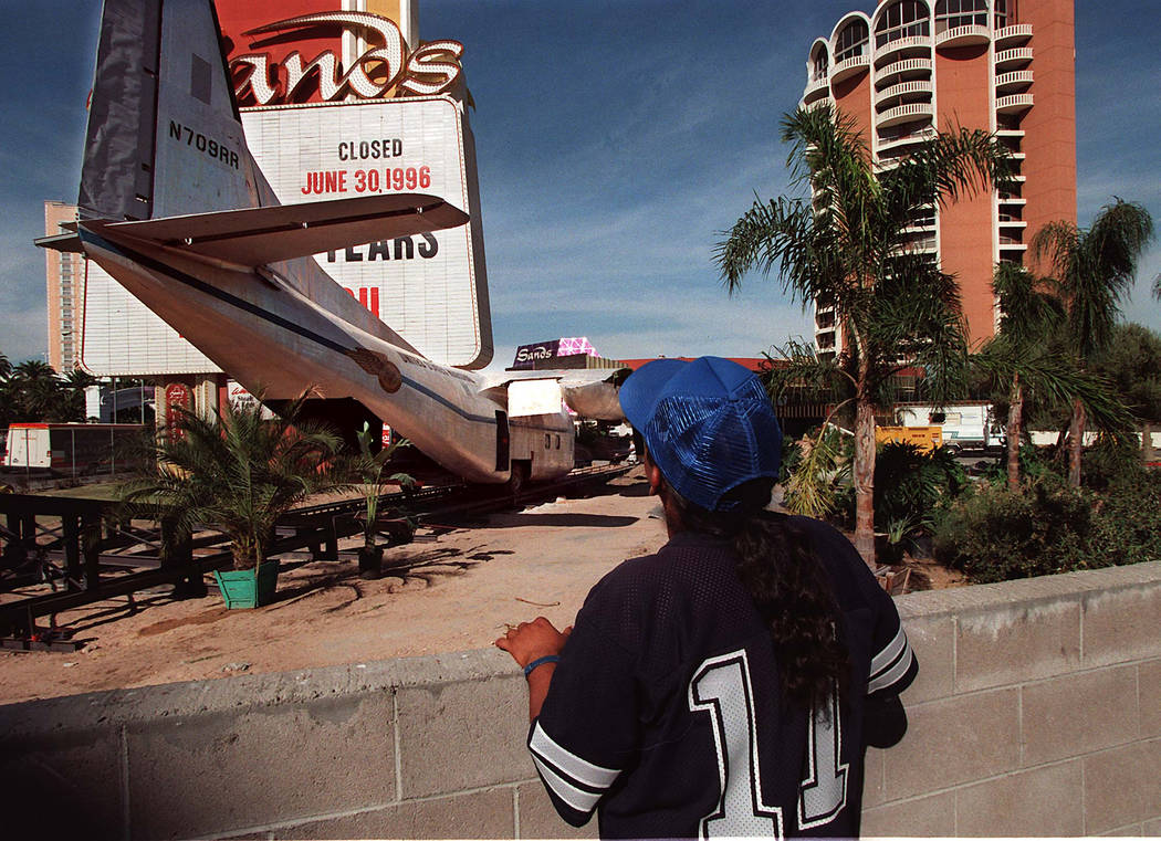 Las Vegan Andrew Moran checks out the airplane movie prop in front of the Sands Hotel on Wednesday afternoon 10/16/96. The scene is for the movie Con AIr being filmed in Las Vegas starring Nichols ...