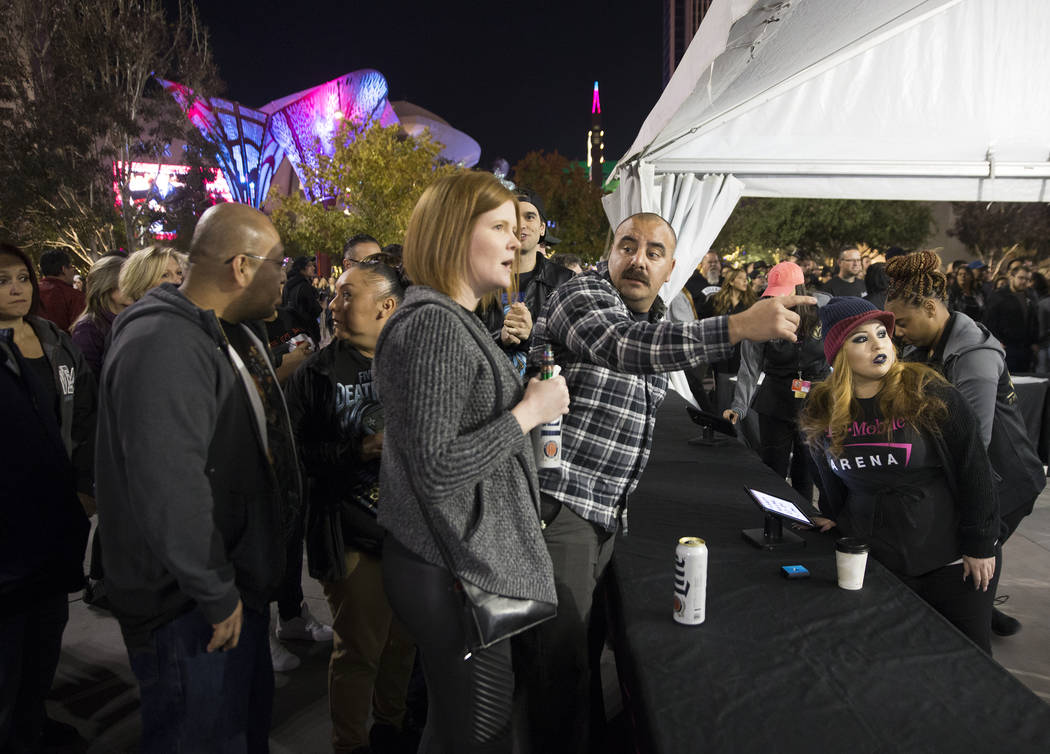 Concert goers buy merchandise before the start of the Metallica show outside T-Mobile Arena on Monday, Nov. 26, 2018, in Las Vegas. Benjamin Hager Las Vegas Review-Journal