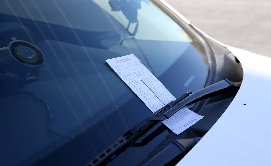 A citation on Joey Lankowski's car where he was distributing food on Foremaster Lane near Las Vegas Boulevard Wednesday, Nov. 28, 2018. Lankowski was cited for parking in a red zone. K.M. Cannon L ...