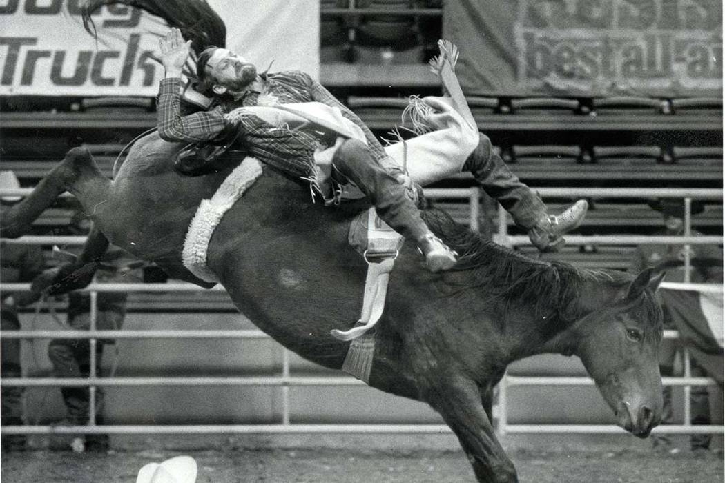 Mickey Young competes in Bareback Riding during the NFR, December 12, 1985. (Wayne Kodey/Las Vegas Review-Journal)