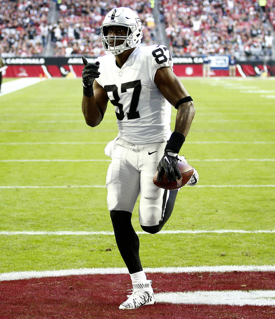 Oakland Raiders tight end Jared Cook (87) scorers a touchdown against the Arizona Cardinals during the first half of an NFL football game, Sunday, Nov. 18, 2018, in Glendale, Ariz. (AP Photo/Ross ...