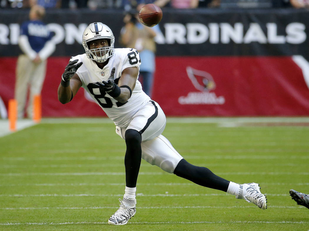 Oakland Raiders tight end Jared Cook (87) makes a catch against the Arizona Cardinals during the first half of an NFL football game, Sunday, Nov. 18, 2018, in Glendale, Ariz. (AP Photo/Rick Scuteri)