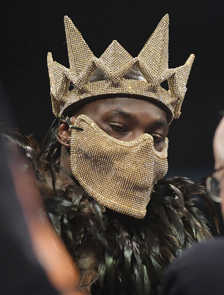 Deontay Wilder wears a mask into the ring before his WBC heavyweight championship boxing match against Tyson Fury, of England, Saturday, Dec. 1, 2018, in Los Angeles. (AP Photo/Mark J. Terrill)