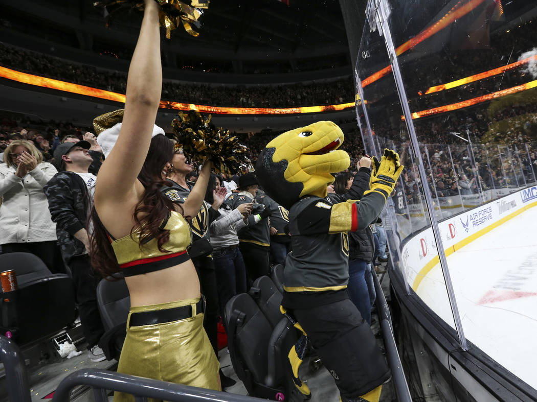 Golden Knights mascot Chance celebrates a goal by defenseman Nate Schmidt, not pictured, during the third period of an NHL hockey game against the Washington Capitals at T-Mobile Arena in Las Vega ...