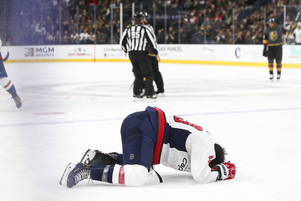 Washington Capitals right wing Tom Wilson reacts after taking a hit from Golden Knights right wing Ryan Reaves, not pictured, during the second period of an NHL hockey game at T-Mobile Arena in La ...