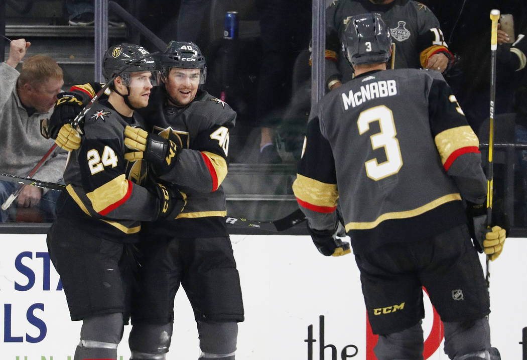 Vegas Golden Knights' Oscar Lindberg (24) celebrates after Ryan Carpenter (40) scored against the Dallas Stars during the first period of an NHL hockey game Sunday, Dec. 9, 2018, in Las Vegas. (AP ...