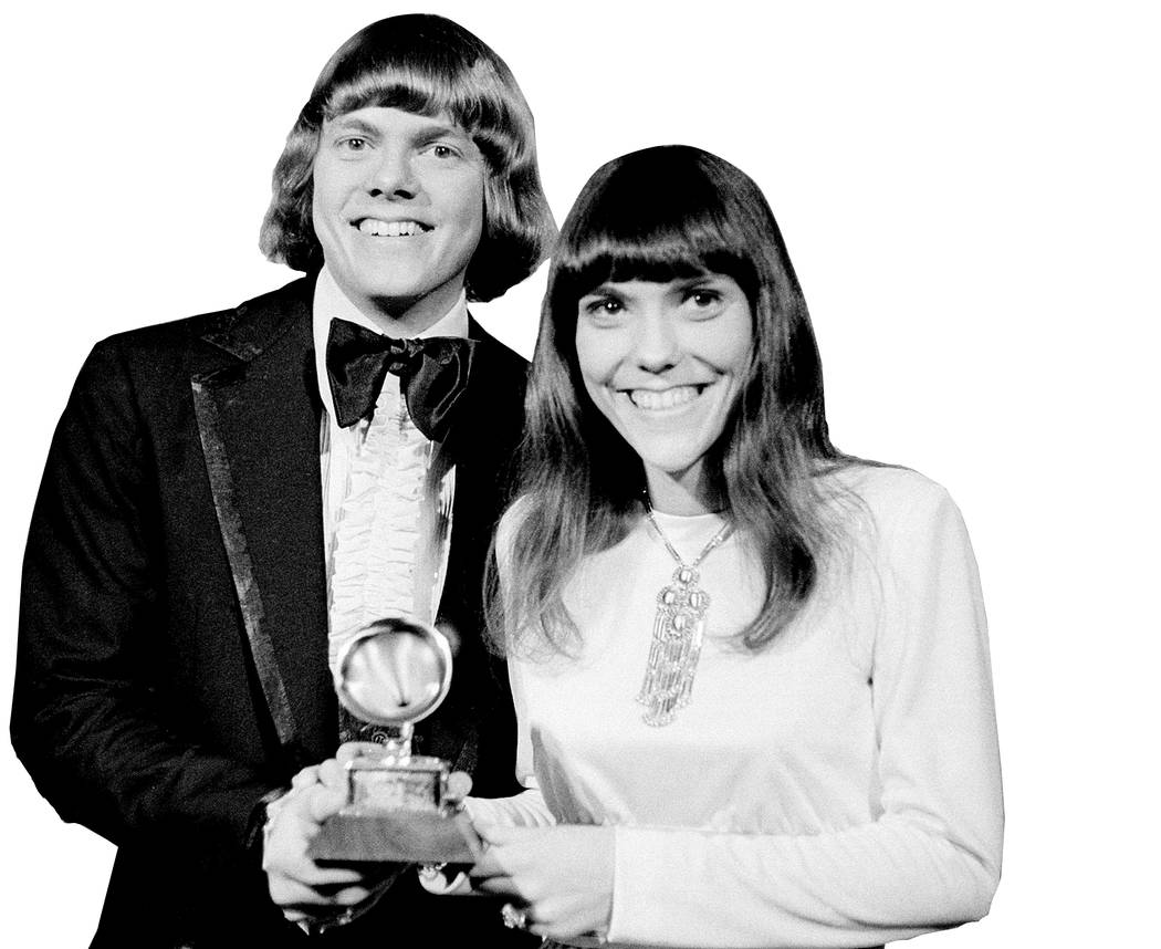 The Carpenters, Richard and Karen, pose with their Grammy during the 13th annual 1970 Grammy Awards in Los Angeles, Ca., March 17, 1971. The brother-sister duo was named best new artist of the ye ...