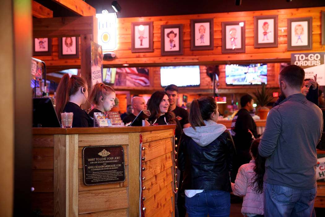 Hostess and hosts welcome guests to the Texas Roadhouse at 1380 E. Craig Road in North Las Vegas Wednesday, Dec. 12, 2018. K.M. Cannon Las Vegas Review-Journal @KMCannonPhoto