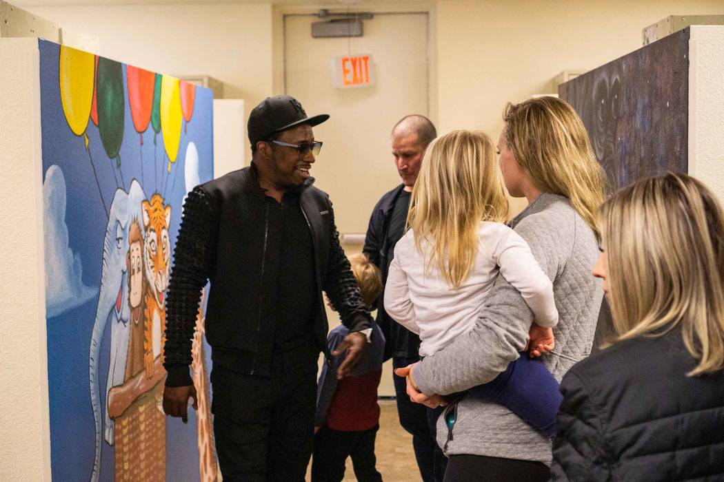 Strip headliner Eddie Griffin tours The Shade Tree Executive Director Stacey Lockhart on Monday, Dec. 10, 2018. (Joshua Chévere Cohen/Prickly Pear Marketing)