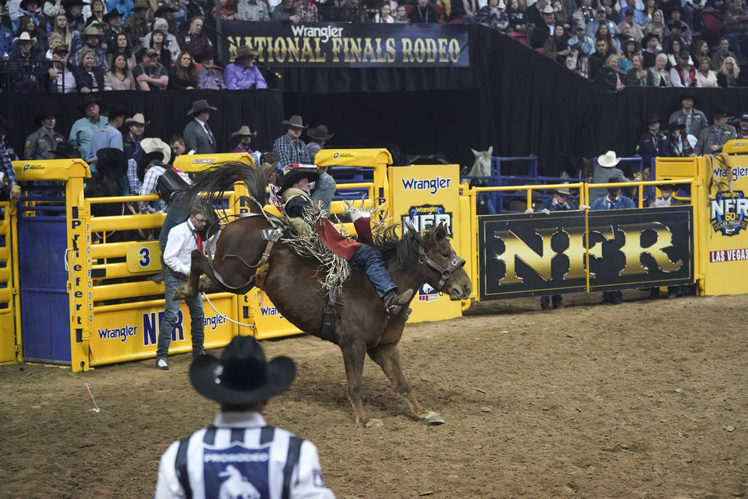 Ty Breuer of Mandan, N.D. competes in the bareback riding event during the sixth go-round of the National Finals Rodeo at the Thomas & Mack Center in Las Vegas on Tuesday, Dec. 11, 2018. Richa ...
