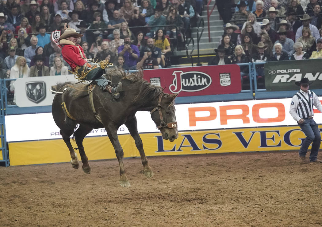 Will Lowe of Canyon, Texas competes in the bareback riding event during the sixth go-round of the National Finals Rodeo at the Thomas & Mack Center in Las Vegas on Tuesday, Dec. 11, 2018. Rich ...